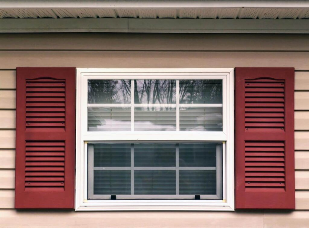 red vinyl siding window