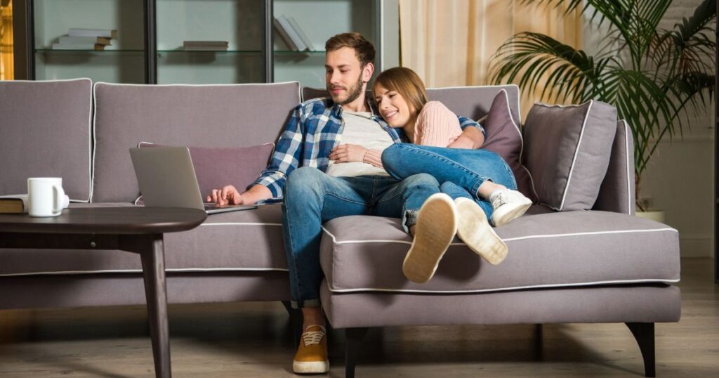 couple relaxing in couch