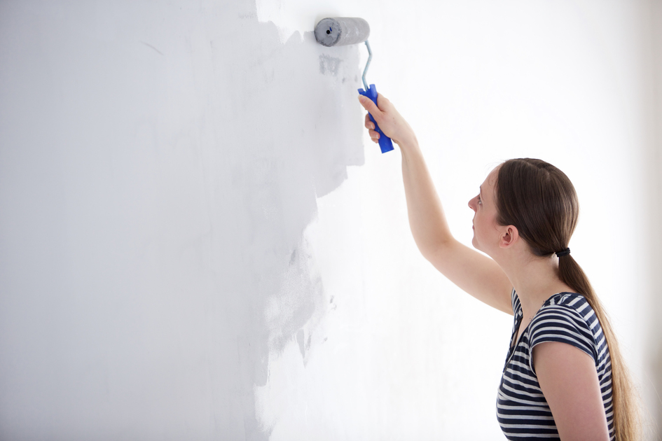 woman using elastomeric paint
